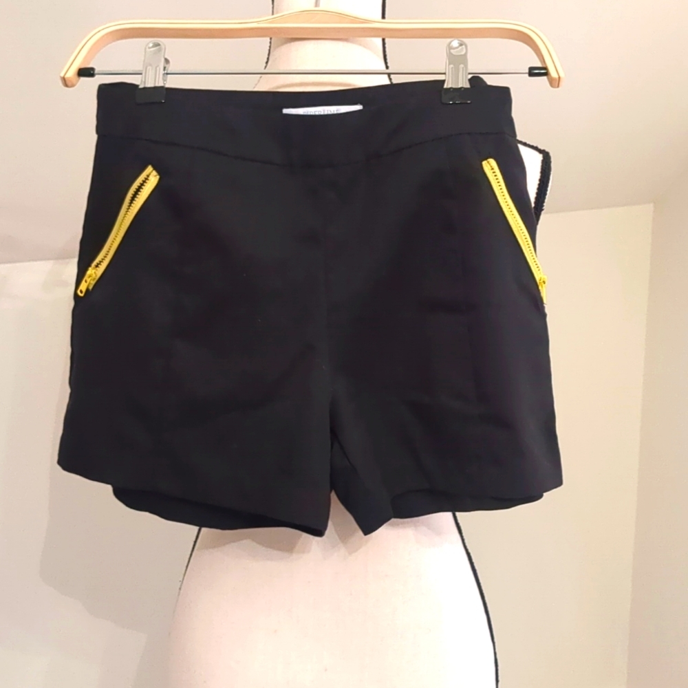 Black Shorts w/yellow accent. Size XS